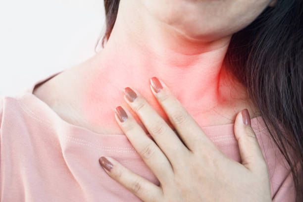 istock Asian woman suffering from acid reflux or heartburn 1149788971