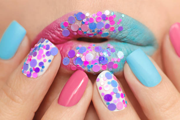 istock Creative multi-colored pastel make-up of lips and nails 1149789802