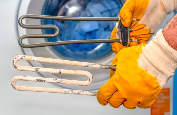istock Mechanical technology industry concept. Comparision of two heaters. New washing machine part and old covered in sediment. 1149794134