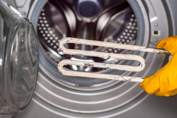 istock Mechanical technology industry concept. Comparision of two heaters. New washing machine part and old covered in sediment. 1149794502