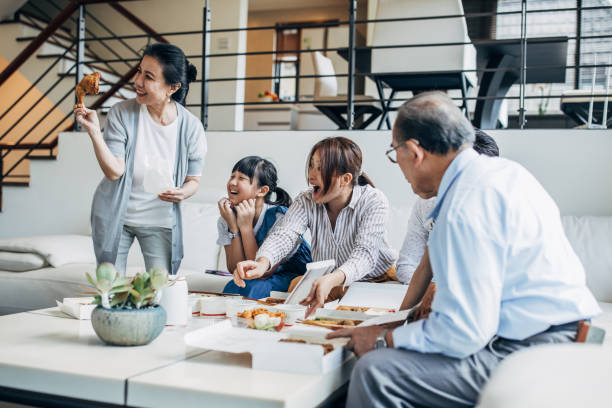 istock Family eating having lunch together 1149795615