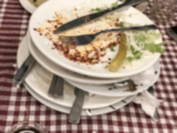 istock blurred background with leftovers and dirty dishes on table 1149796102