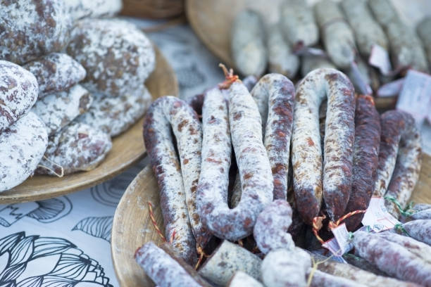 istock Dry salami and sausages at grocer’s store 1149800728