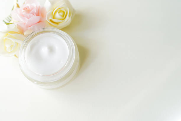 istock cosmetics, jar dairy cream with wheat isolated on white background with copy space. Without label. top view . concept of care, bath, spa 1149801916