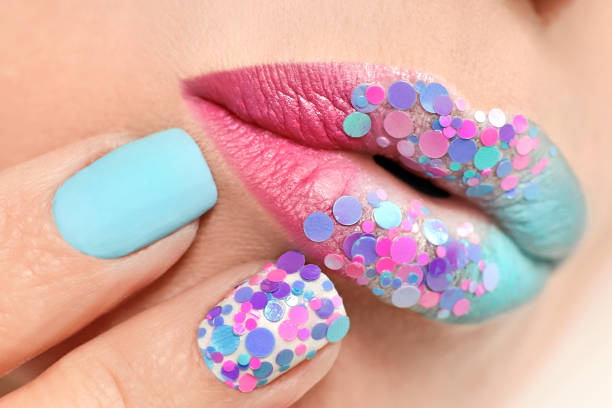 istock Creative multi-colored pastel make-up of lips and nails 1149805962