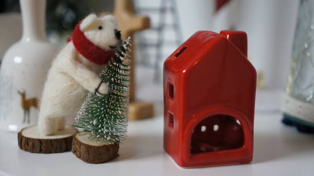 istock Winter landscape with bear and house 1149806097