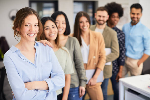 istock Business group portrait in a corporate office. 1149806563