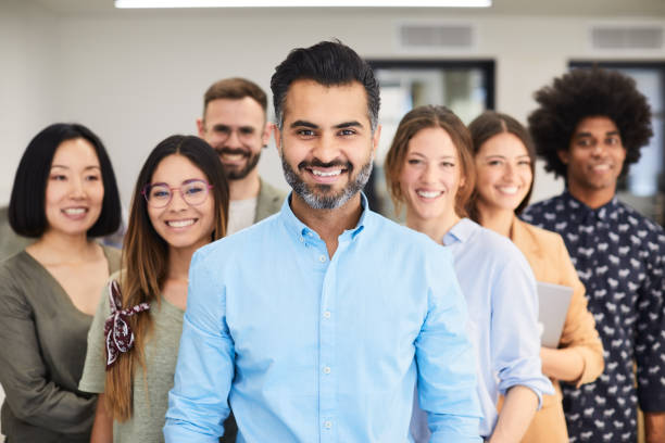 istock Business group portrait in a corporate office. 1149806564
