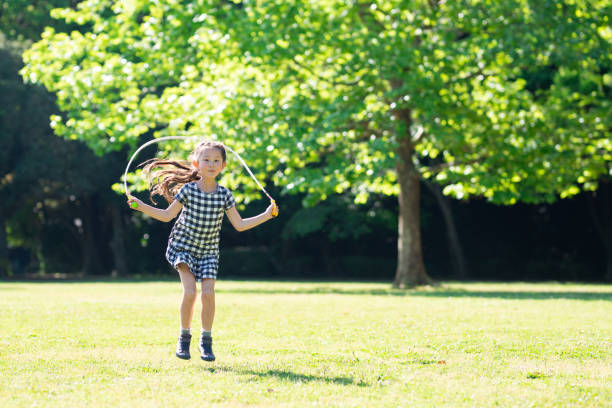 istock Girl playing with skipping rope 1149809224