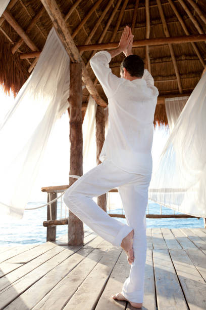 istock man in a bungalow on the sea 1149814468