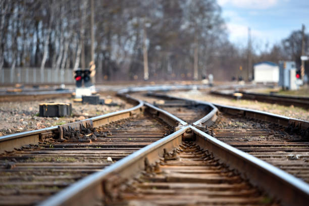istock Large empty railroad fork. Concept of industrial logistic and transportation background with selected focus on railroad fork with 1149815731