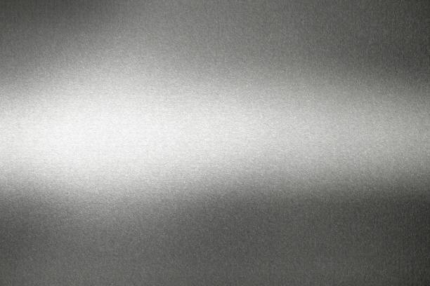 istock Light shining on black metal wall, abstract texture background 1149818072