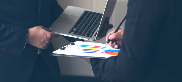 istock businessman check the work documents in office,The media reaches the operational guidelines 1149818350