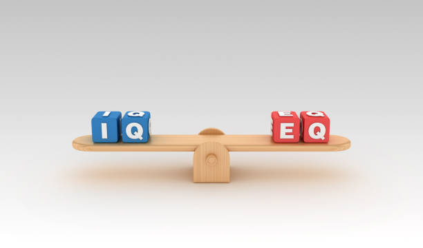 istock Seesaw with IQ EQ Buzzword Cubes - 3D Rendering 1149818385