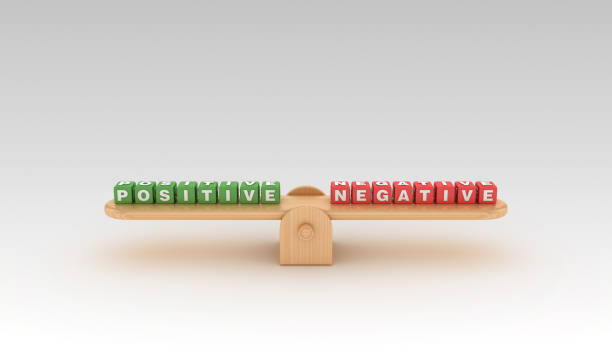 istock Seesaw with POSITIVE NEGATIVE Buzzword Cubes - 3D Rendering 1149818402