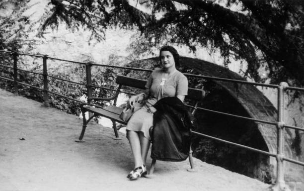 Elegant dressed lady having fun visiting Merano in the 1936.Italy.