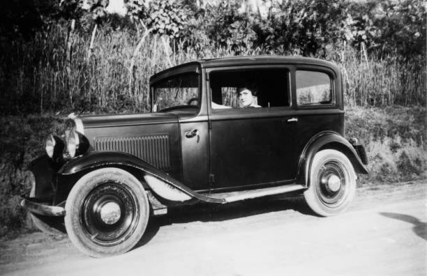 istock Elegant dressed lady having fun driving, 1936 Ancona, Marche. Italy. 1149818793