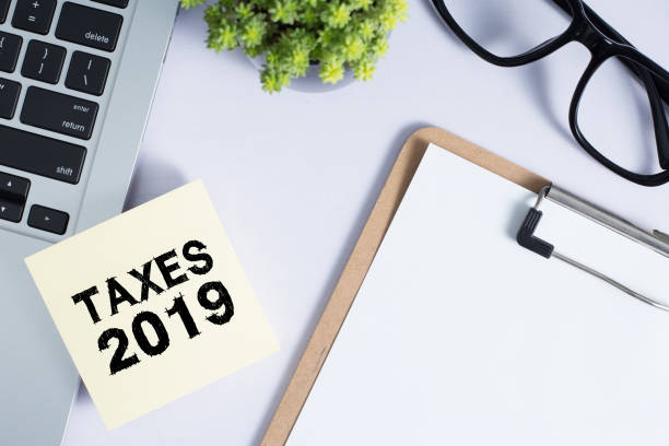 istock Taxes 2019 Concept On Sticky Note 1149819577