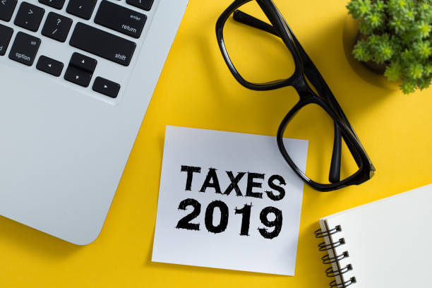 istock Taxes 2019 Concept On Sticky Note 1149819634