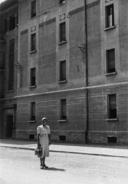 Elegant dressed lady having fun visiting Merano in the 1936.Italy.