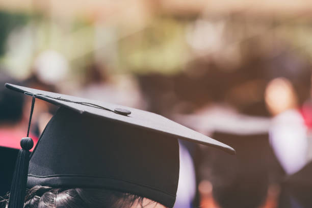 istock Group of Graduates during commencement. Concept education congratulation in University. Graduation Ceremony 1149820345