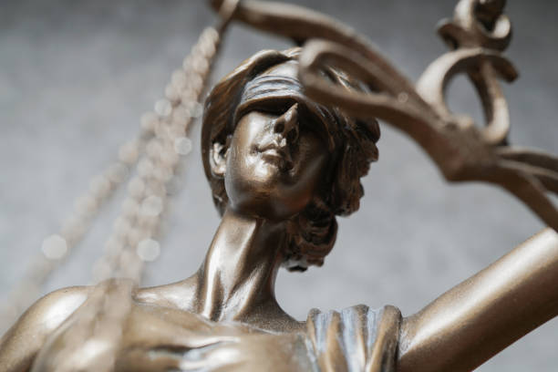 istock blindfolded lady justice or iustitia bronze statue 1149820524
