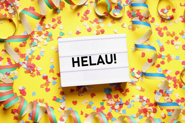 Helau is a traditional german fool's call used during carnival Helau is a traditional german fool's call used during carnival in Germany - flat lay with confetti and streamers mainz stock pictures, royalty-free photos & images