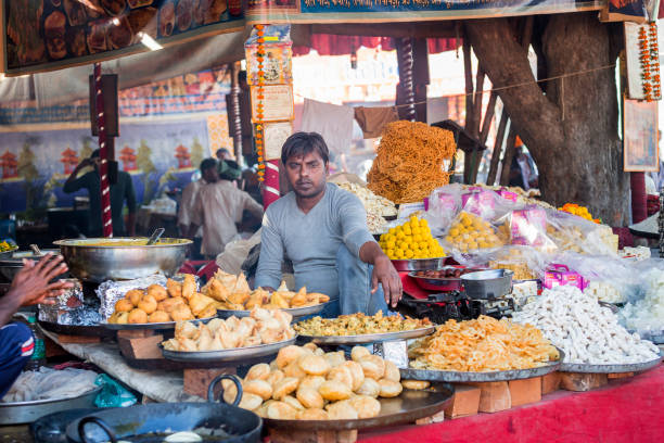 unidentified vendor selling food items at Pushkar Camel Fair Pushkar, Rajasthan, India on  17 november 2018