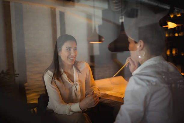 istock Female colleagues working late 1149825988