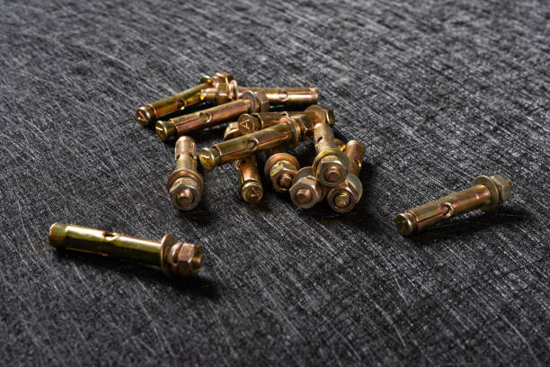 istock several expansion bolts on a dark background 1149831369