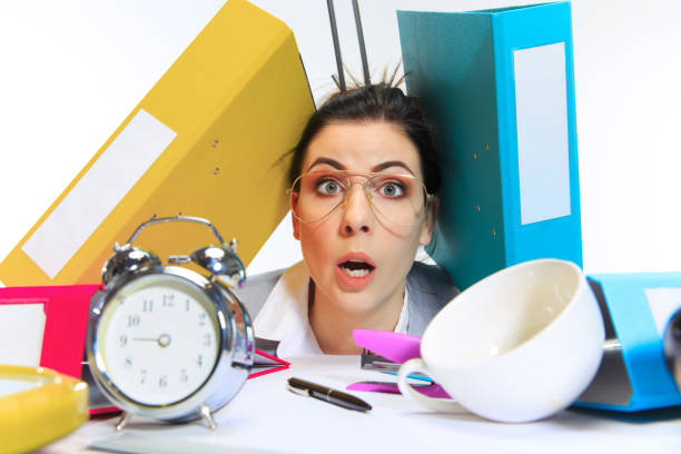 istock Young woman getting a lot of work and deadline 1149832882