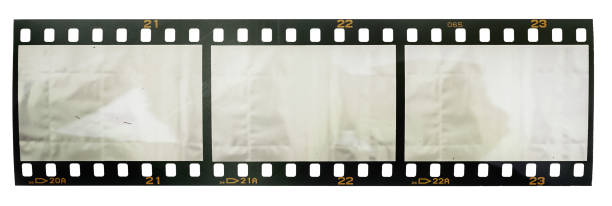 real macro photo of 35mm film strip or snip on white background stock photo