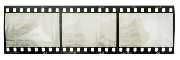 real macro photo of 35mm film strip or snip on white background - laboratory glassware fotos imagens e fotografias de stock