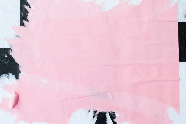 istock Colorful sheets of torn paper pasted on the wall. 1149837791