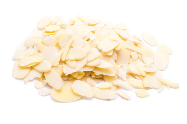 istock Sliced ​​almonds isolated on white background 1149841287