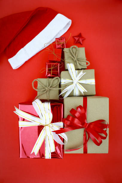istock Many gift boxes on red background with Christmas concept. 1149852340