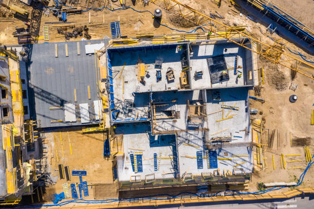 istock Crane and highrise construction site. aerial View 1149859251