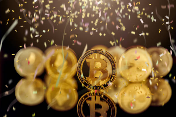 istock 1st prize block chain cryptocurrency business strategy ideas concept  bit coin on reflection floor dark color tone with victory celebrate confetti paper shoot 1149860035