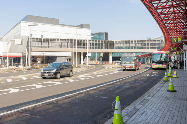 bus stop at the new chitose (shin chitose) airport in winter in hokkaido, japan - new chitose imagens e fotografias de stock