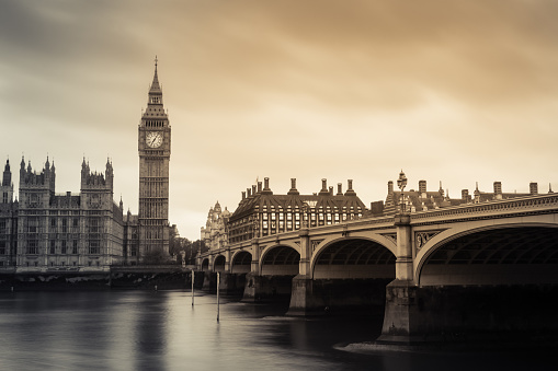 Big Ben and Westminster bridge in London, England. Black and white