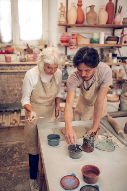 istock Top view of a nice handsome man painting 1149878975
