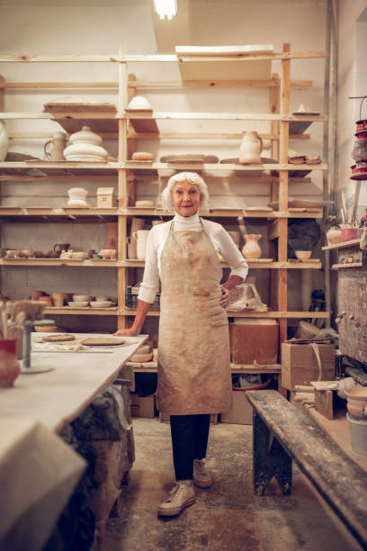 istock Joyful aged woman having her own business 1149879077