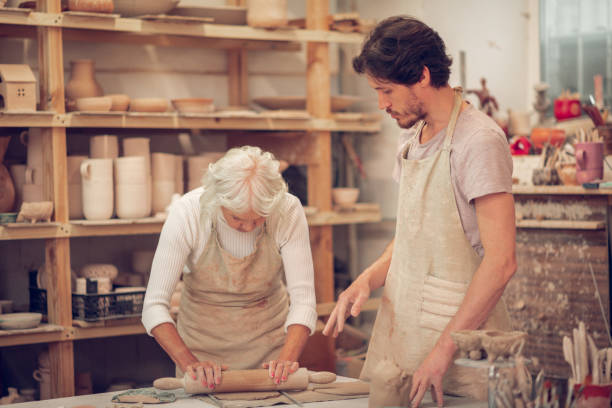 istock Serious bearded man looking at his colleague 1149879094