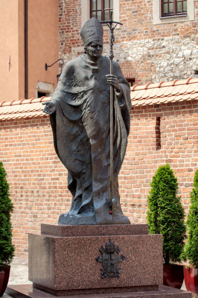 Wawel Royal Castle in Krakow, Poland Krakow, Poland - 14 August, 2017: Statue of Pope John Paul II in the Wawel Royal Castle in Krakow, Poland. pope john paul ii stock pictures, royalty-free photos & images