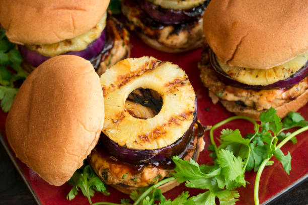 teriyaki turkey burger with grilled pineapple - turkey burger imagens e fotografias de stock