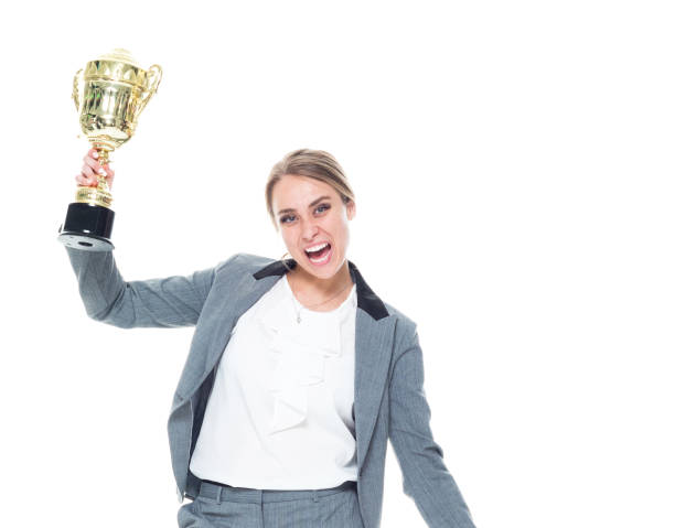 istock Businesswoman holding a trophy 1149886960