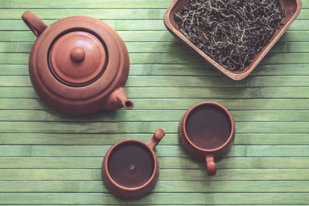 istock Pu-erh Tea Mao-Cha in clay teaware 1149888266