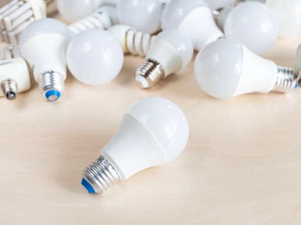 istock one LED bulb light and many different lamps 1149888356