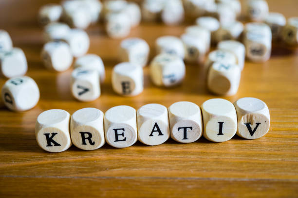 istock Creative with wooden cubes written in german 1149890038