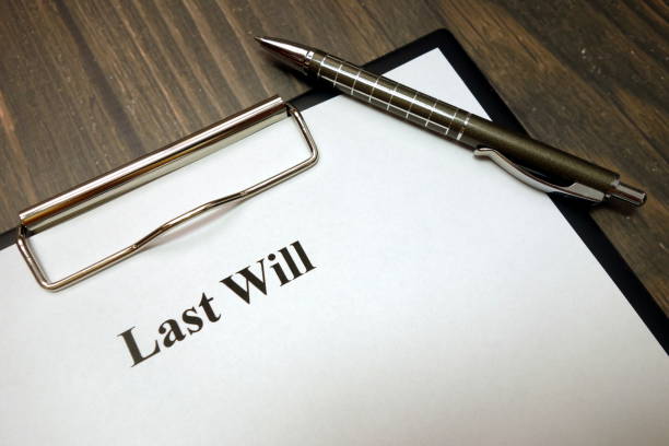 istock Clipboard with last will and pen on desk 1149891030
